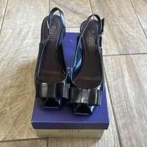 Nickels Patton, leather black heels with bow detail on toe